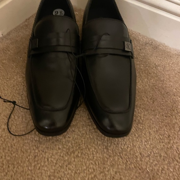 Brand new Calvin Klein men’s black loafers